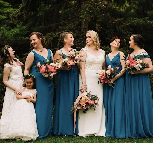 flower girl standing with bridal party