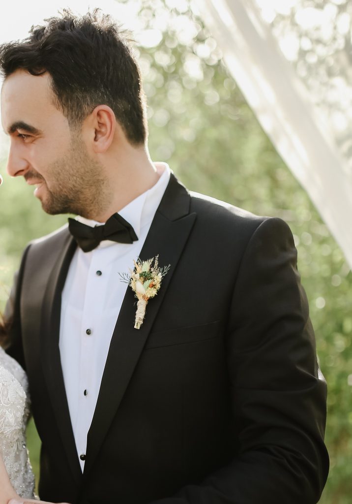 male in black tie attire 