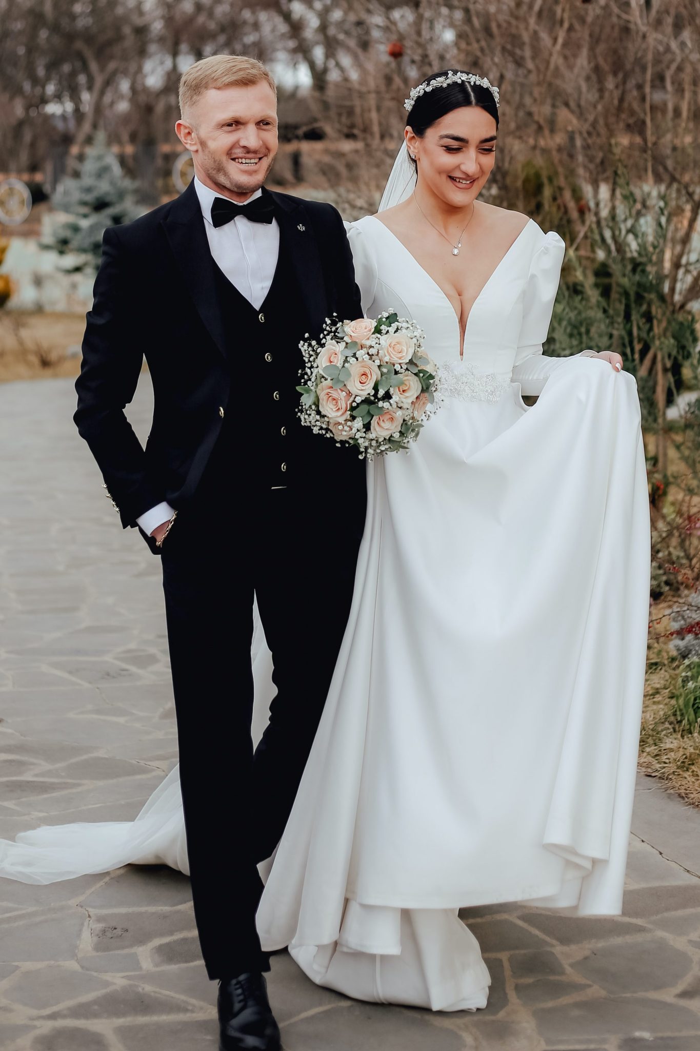 bride and groom in black tie attire